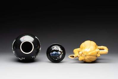 A Chinese celadon-glazed water dropper, a yellow-glazed ewer, a famille noire covered vase and a miniature model, 19th C.