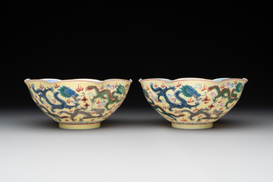 A pair of Chinese eggshell famille rose 'dragon' bowls, Qianlong mark, 20th C.