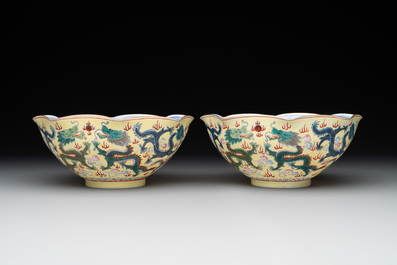 A pair of Chinese eggshell famille rose 'dragon' bowls, Qianlong mark, 20th C.
