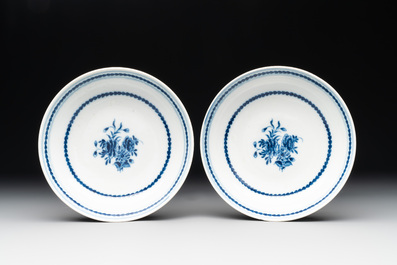 A pair of Chinese blue and white cups and saucers and a milk jug, Qianlong/Jiaqing