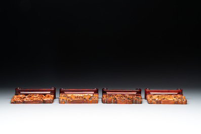 A Chinese octagonal gilt-lacquered wooden stand and four wooden carvings on stands, 19th C.