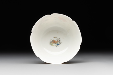 A Chinese polychrome-decorated cup and saucer with ducks and flowers, Yongzheng