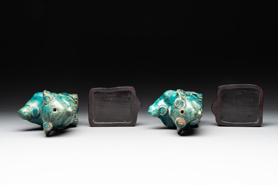 A pair of Chinese turquoise-glazed Buddhist lions on stands, probably Swatow kilns, 19th C.
