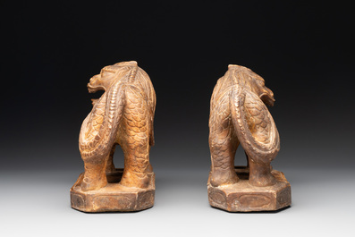 A pair of Chinese archaistic stone mythical beasts, 20th C.
