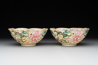A pair of Chinese eggshell famille rose 'dragon' bowls, Qianlong mark, 20th C.