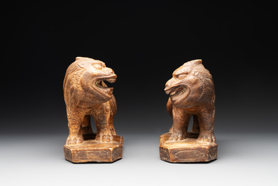 A pair of Chinese archaistic stone mythical beasts, 20th C.