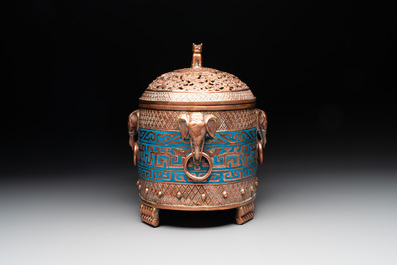 A Chinese cloisonn&eacute; covered censer depicting monks and a covered censer with elephant head handles, 20th C.