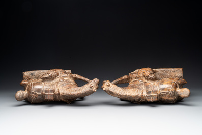 A pair of Chinese archaistic carved stone horses, 20th C.