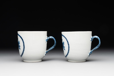 A pair of Chinese blue and white cups and saucers and a milk jug, Qianlong/Jiaqing
