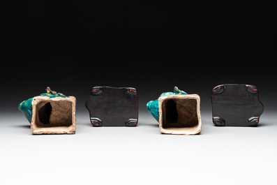 A pair of Chinese turquoise-glazed Buddhist lions on stands, probably Swatow kilns, 19th C.