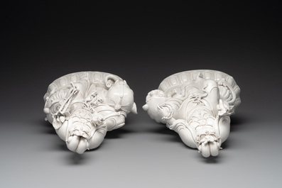 A pair of Chinese Dehua blanc de Chine Bodhisattvas seated on an elephant and a Buddhist lion, 20th C.
