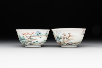 Two Chinese famille rose cups and three saucers with a fine landscape design, Yongzheng/Qianlong