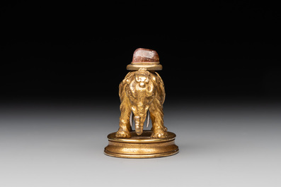A Chinese pink quartz-inset gilt bronze elephant, 18th C.