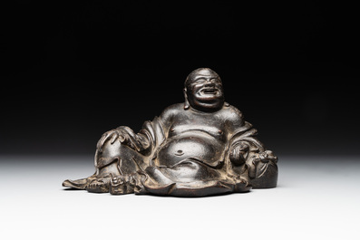 A Chinese bronze Budai, 17th C.