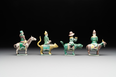 Eight Chinese verte biscuit figures riding mythical animals, 19/20th C.