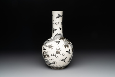 A Chinese black-enamelled  biscuit 'dragon' vase, Qianlong mark, 19th C.