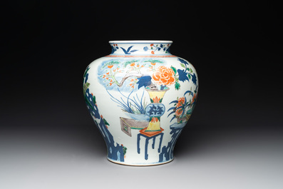 A Chinese wucai vase and seven blue and white jarlets, 19th C.
