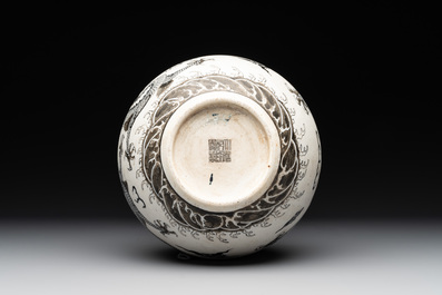 A Chinese black-enamelled  biscuit 'dragon' vase, Qianlong mark, 19th C.