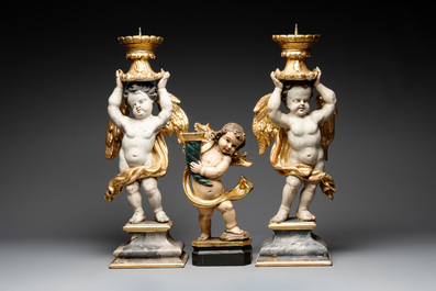 Three gilt and polychromed wooden angel-form candlesticks, Germany, 18th C.
