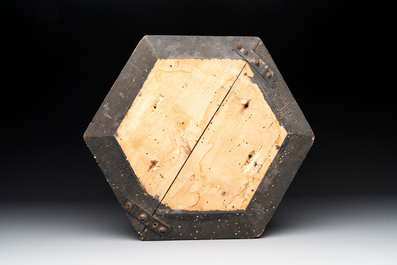 A hexagonal tile with stylised floral design, Damascus, 17th C.