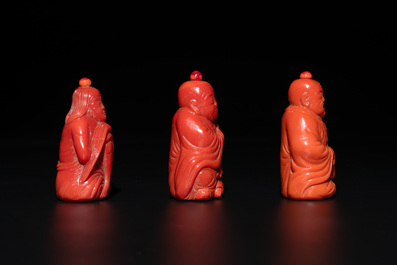 A set of ten Chinese coral-red glass Luohan-form snuff bottles, 20th C.