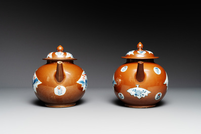 A pair of large Chinese Imari-style capucin-brown-ground teapots and two famille rose chocolate pots, Qianlong