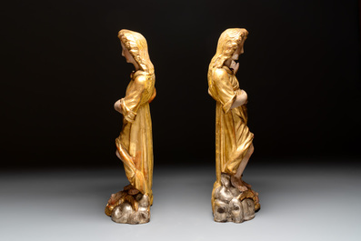 A pair of gilt and polychromed wooden figures of angels, Germany, 18th C.