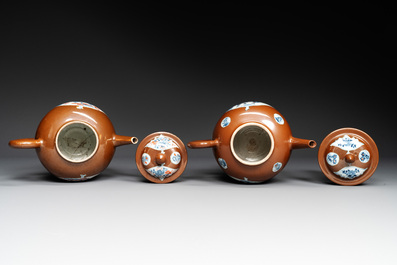 A pair of large Chinese Imari-style capucin-brown-ground teapots and two famille rose chocolate pots, Qianlong