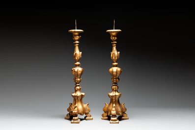 Five gilt-lacquered Baroque candlesticks, probably Germany, 18/19th C.