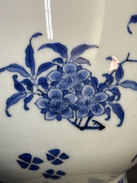 A Chinese blue and white pear-shaped vase with floral design, Transitional period