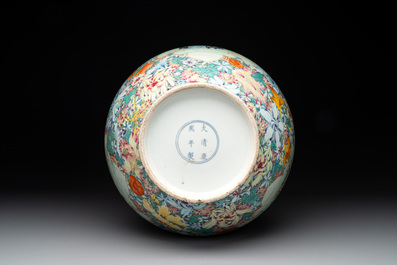 A fine Chinese famille rose 'millefleurs' bottle vase with immortals, Kangxi mark, Republic