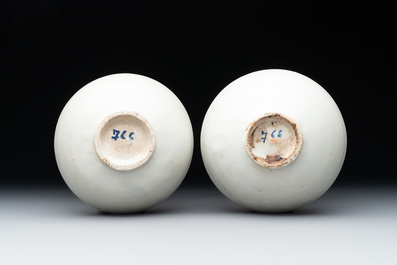 Four Chinese white-glazed saucers and three bowls, Yuan/Ming