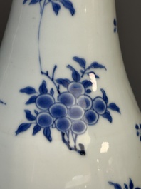 A Chinese blue and white pear-shaped vase with floral design, Transitional period