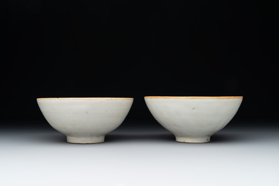 Four Chinese white-glazed saucers and three bowls, Yuan/Ming