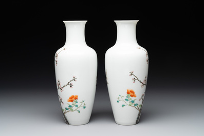 A pair of Chinese famille rose 'birds among flowering branches' vases, Ju Ren Tang 居仁堂製 mark, Republic
