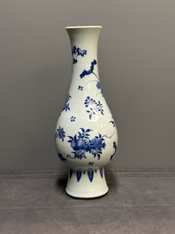 A Chinese blue and white pear-shaped vase with floral design, Transitional period