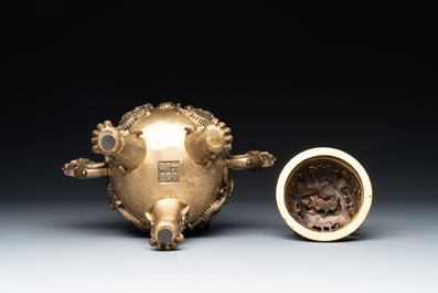 A Chinese bronze covered censer, a seal and a Japanese bronze covered censer, Xuande mark, 20th C.