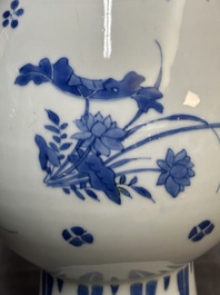 A Chinese blue and white pear-shaped vase with floral design, Transitional period