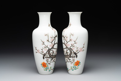 A pair of Chinese famille rose 'birds among flowering branches' vases, Ju Ren Tang 居仁堂製 mark, Republic