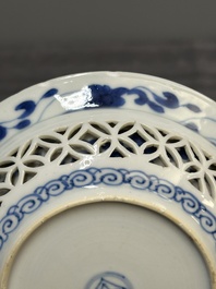 A Chinese blue and white reticulated double-walled cup and saucer, fu mark, Kangxi