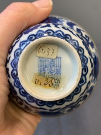 A Chinese gilt-decorated blue and white 'lotus scroll' bowl, Daoguang mark and of the period