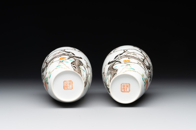 A pair of Chinese famille rose 'birds among flowering branches' vases, Ju Ren Tang 居仁堂製 mark, Republic