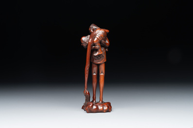 A small Kutani porcelain incense burner, two wooden sculptures, and a shagreen glasses case, Japan, Meiji, 19/20th C.