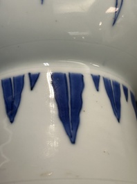 A Chinese blue and white pear-shaped vase with floral design, Transitional period