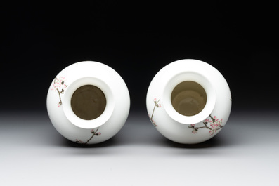 A pair of Chinese famille rose 'birds among flowering branches' vases, Ju Ren Tang 居仁堂製 mark, Republic