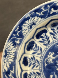 A Chinese blue and white reticulated double-walled cup and saucer, fu mark, Kangxi
