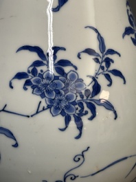 A Chinese blue and white pear-shaped vase with floral design, Transitional period