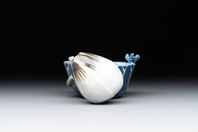 A Chinese copper-red, blue and white lotus-shaped water dropper, Kangxi