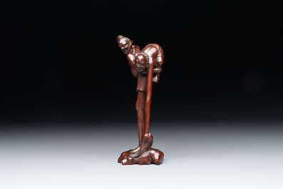 A small Kutani porcelain incense burner, two wooden sculptures, and a shagreen glasses case, Japan, Meiji, 19/20th C.