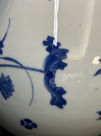 A Chinese blue and white pear-shaped vase with floral design, Transitional period